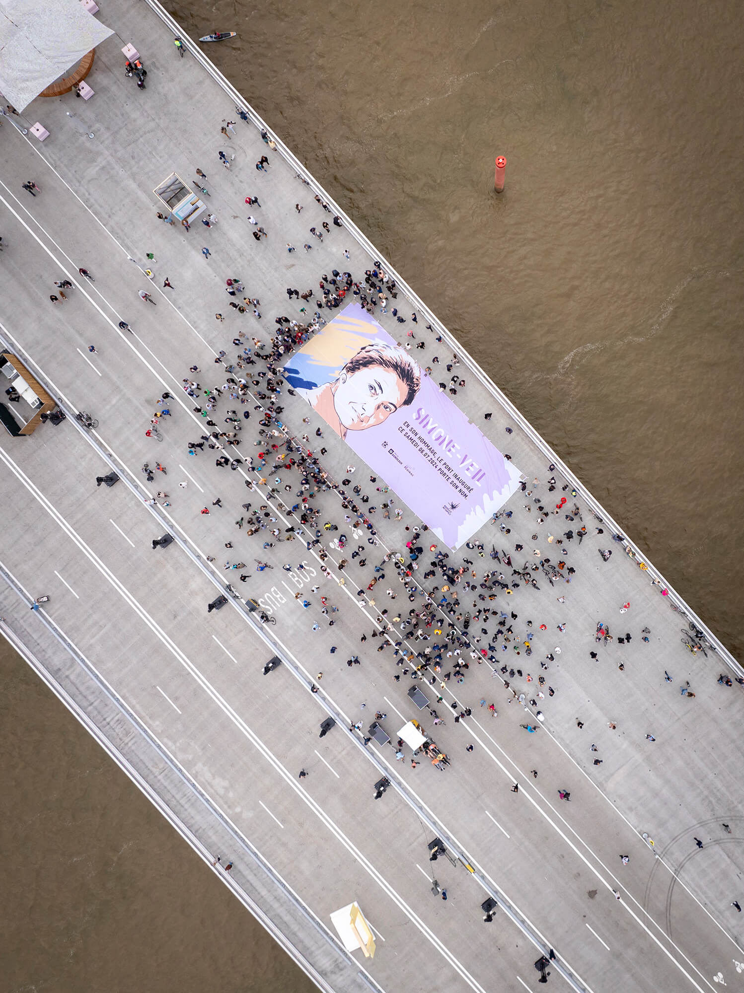 aerial view of the bridge with large poster of Simone Veil