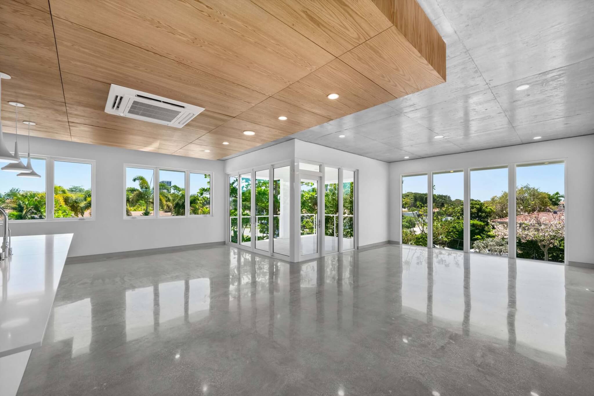interior with wood ceilings and concrete floors