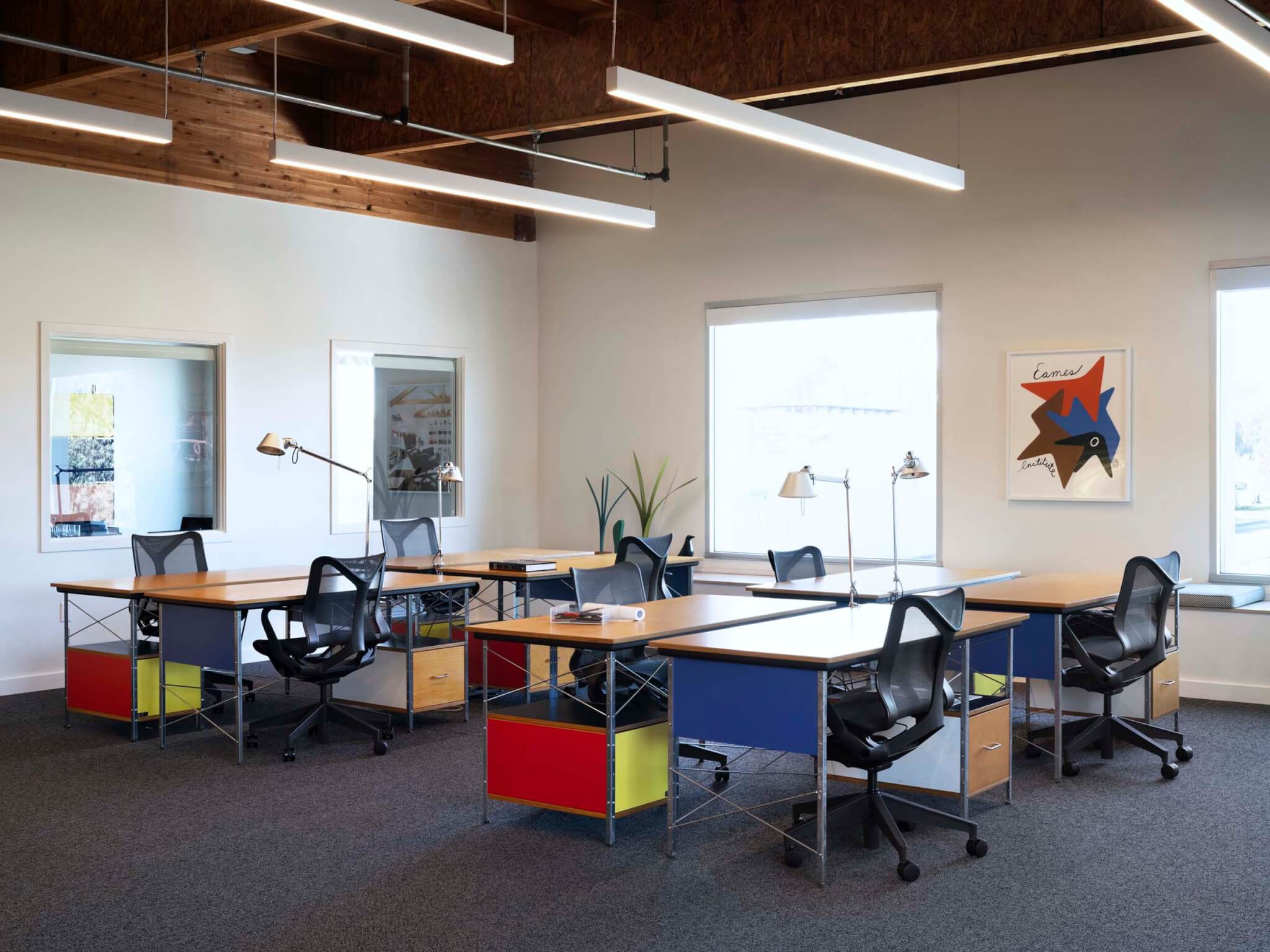Eames Institute office and archive space in Richmond, California. Eames furniture and primary color palette.