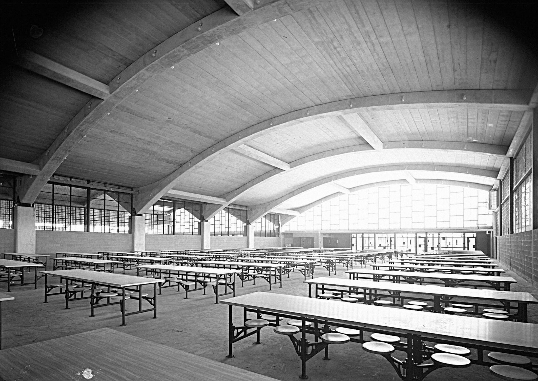 cafeteria tables nailed to the ground