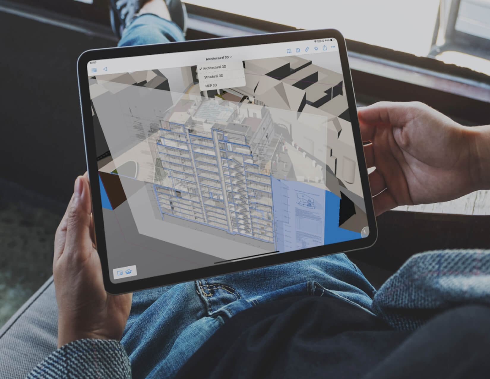 Graphisoft Apple Vision Pro program displaying a 3D sectional building drawing on an iPad