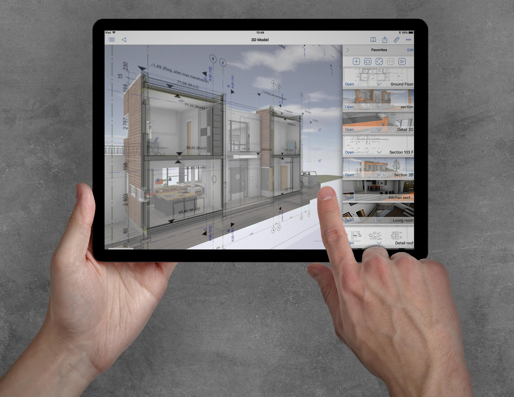 Graphisoft Apple Vision Pro program showing 3D building model in section on an iPad