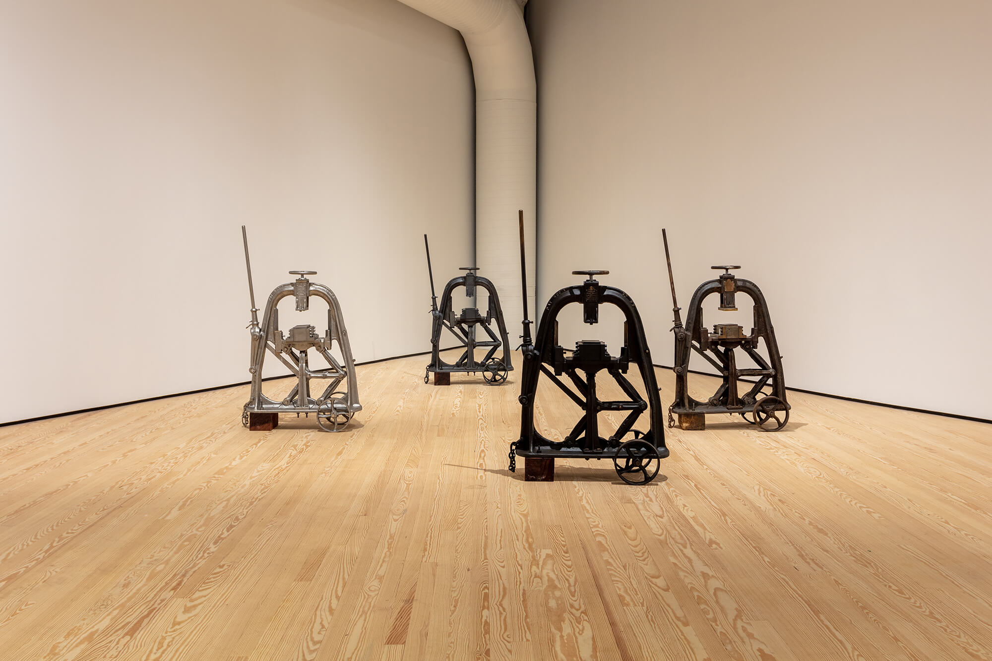 sculptures staged in a gallery
