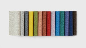 textile samples ordered in rainbow order