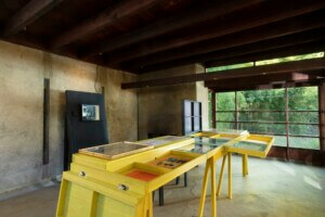 wood display tables showcasing drawings