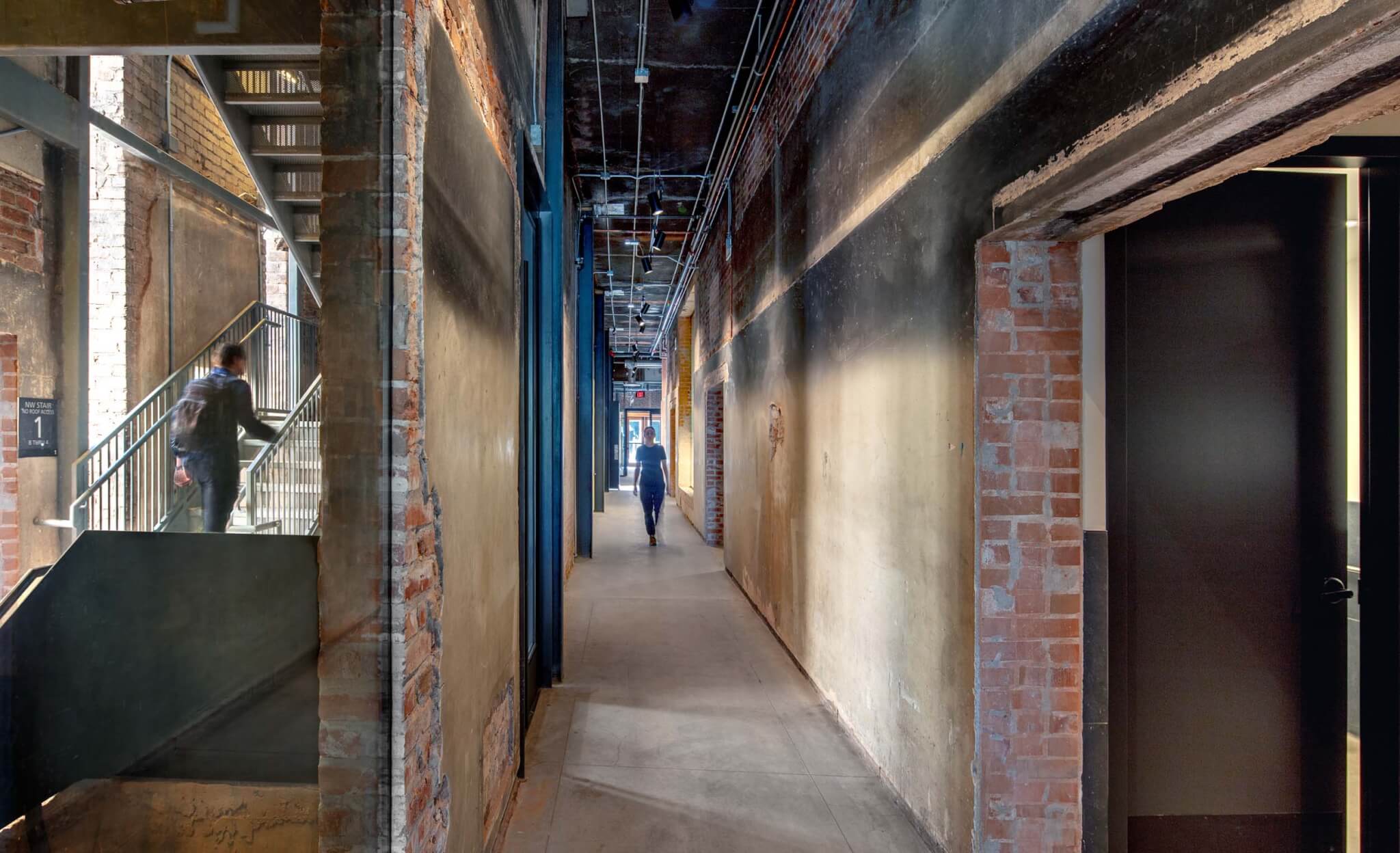 new staircase and doorways in shell of existing brickwork